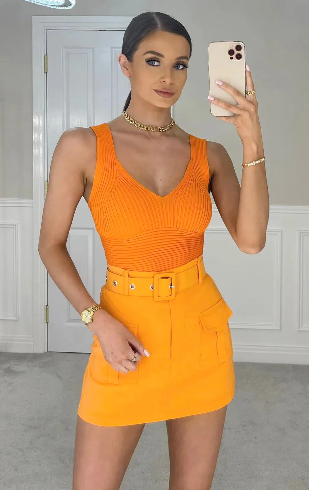 REENA ORANGE CARGO BELTED MINI SKORT